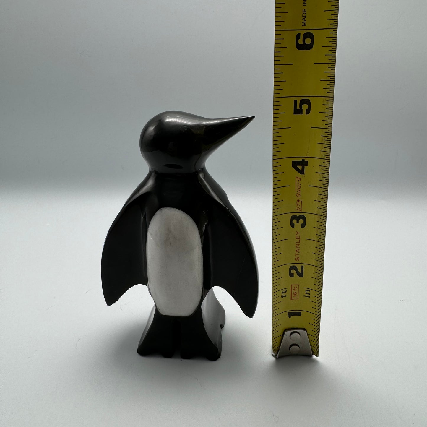 Black and White Carved Stone Penguin (Cracked Wing as Disclosed)