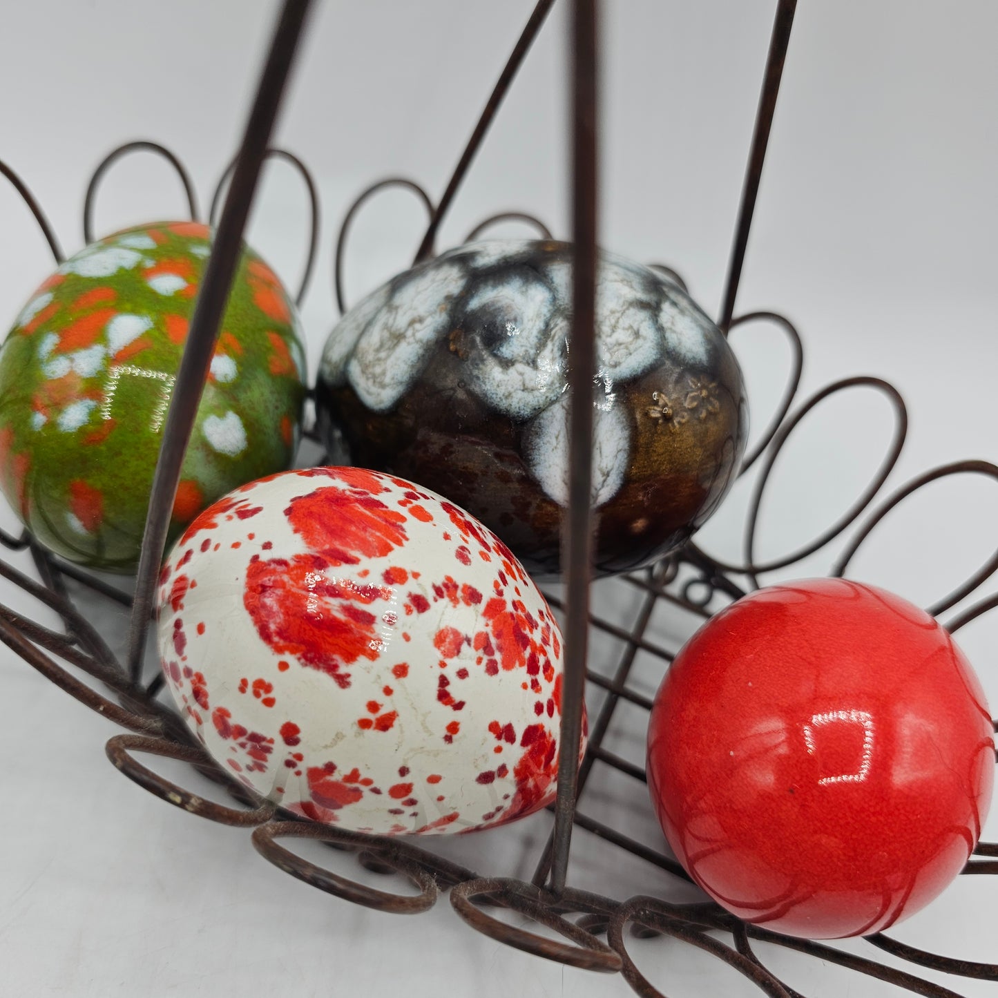 Vintage Painted Ceramic Eggs in Metal Basket